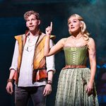 & Juliet original Broadway cast Anne Hathaway holds her finger up as William Shakespeare starts to speak