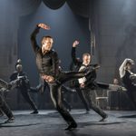 Swan Lake The Stranger Will Bozier 'The Stranger' and formal dressed men dance in sync.